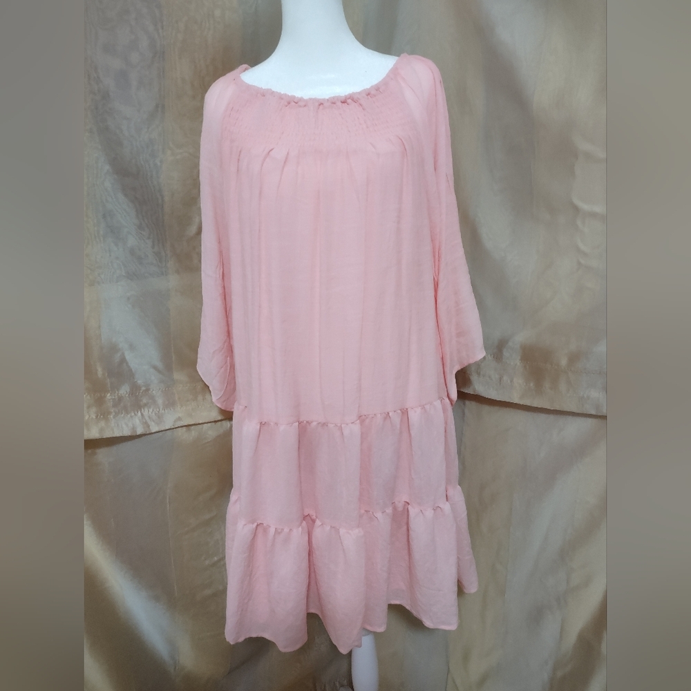 NWT Women's light pink 3/4 sleeve dress. Can be worn on or off shoulder. Size M